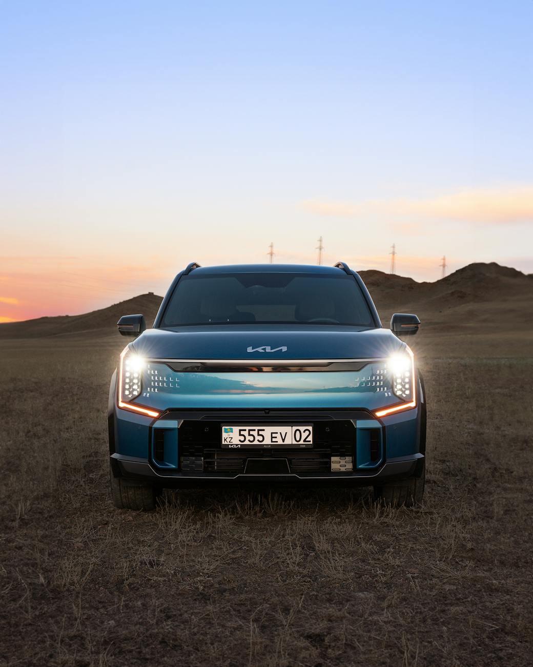 New Kia Seltos 2026: Complete Review, Features, Price & Specifications electric suv at sunset in kazakh steppe